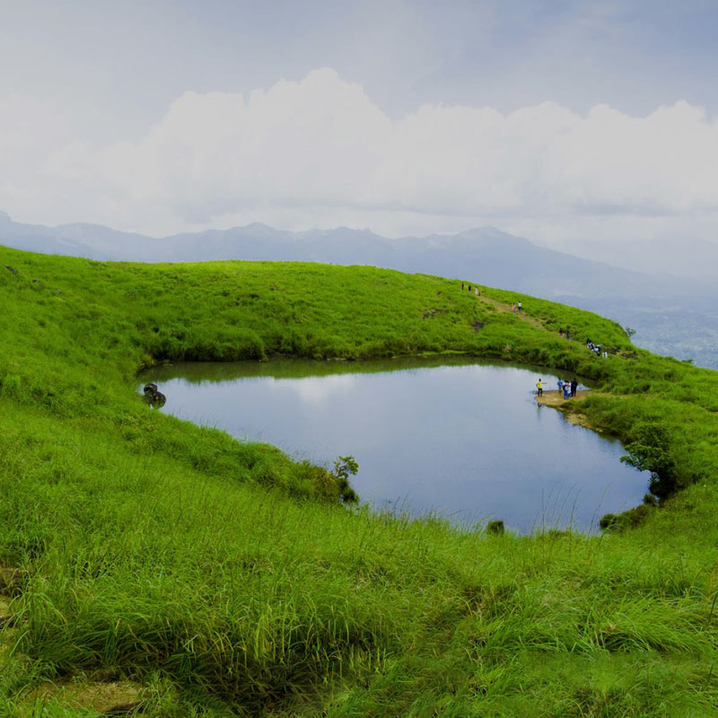 Peaks, Caves & Hidden Wonders  bana height wayanad